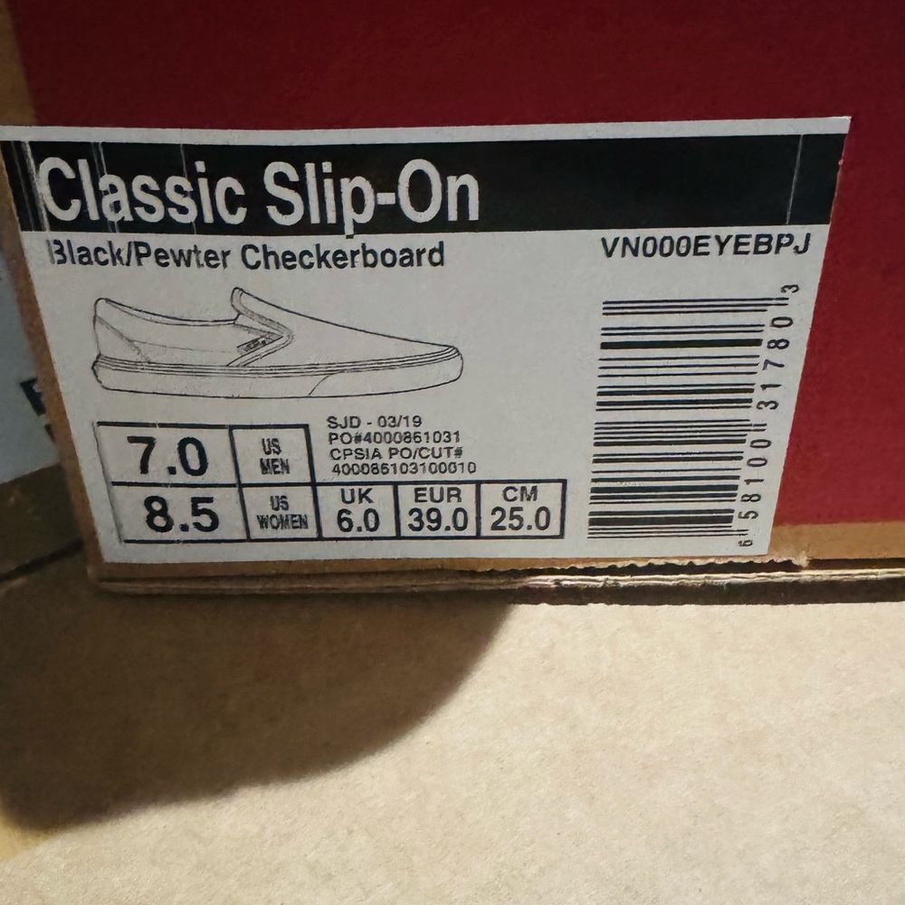 Slightly Used Vans Black and Gray Slip-On Sneakers